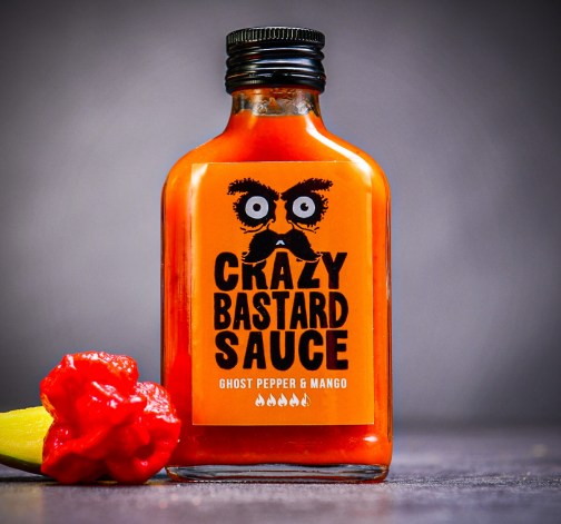 Extra ostrá indická omáčka Crazy Bastard Ghost Pepper & Mango s Bhut Jolokia 100 ml