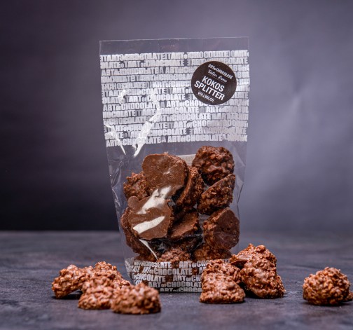 Kousky kokosu v luxusní mléční čokoládě 150 g